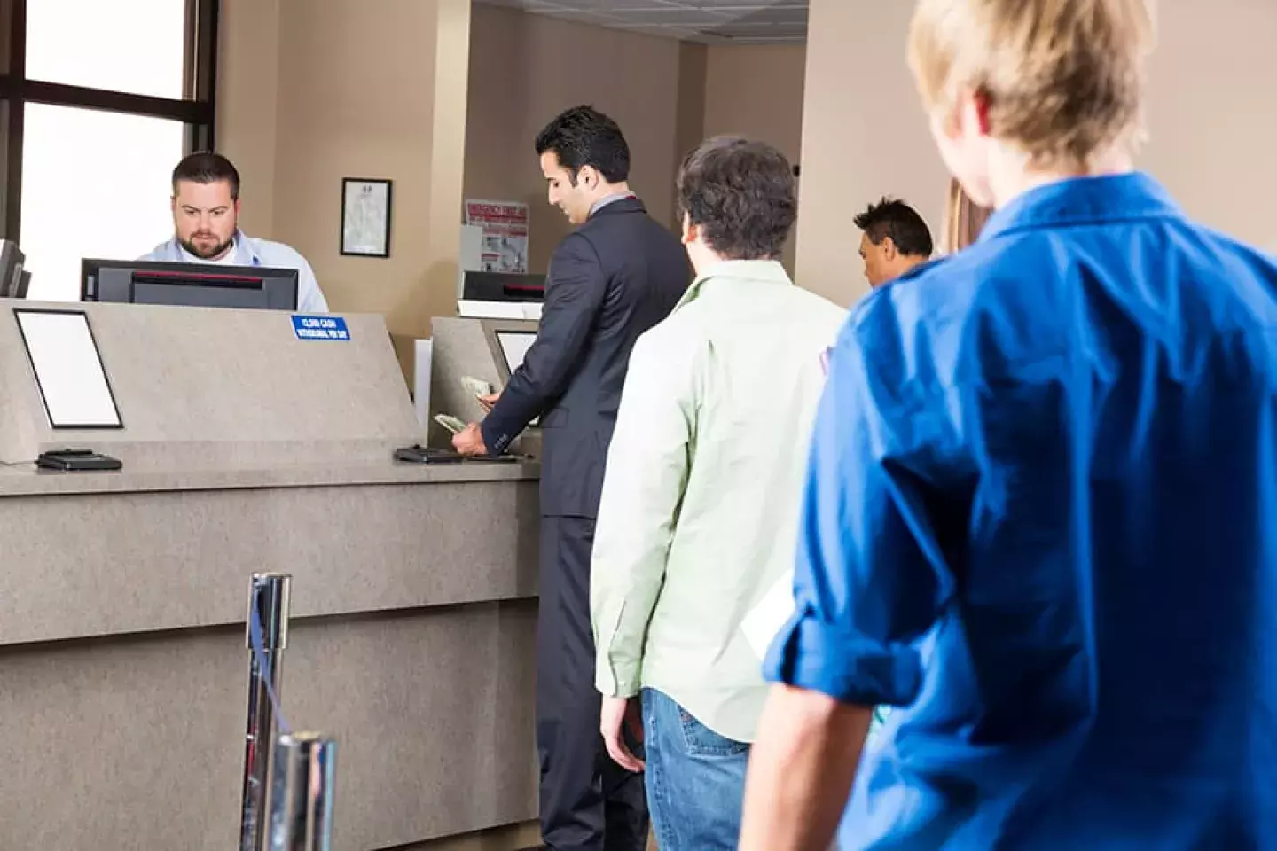 people in line at a bank